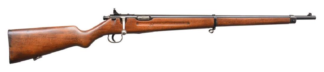 SAVAGE NRA MATCH BOLT ACTION RIFLE.: Cal. 22 LR. S# 27687. Bbl. 25 1/4". Blade front sight w/ windage & elevation adjustable peep receiver sight. Band fastened finger groove walnut stock w/ steel nose cap, sling swivels & grooved steel b