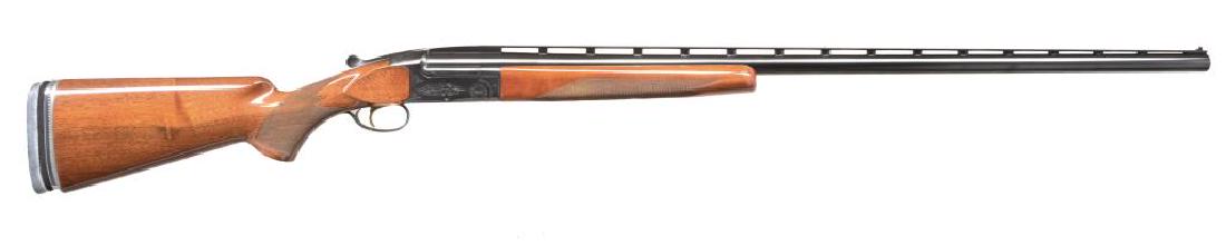 BROWNING BT99 SINGLE BARREL TRAP SHOTGUN.: Cal. 12 Ga. S# 70D02331. Vent rib 34" bbl. Blued steel action & bbl. 1970 Mfg. Checkered walnut pistol grip stock w/ adj. buttplate & straight comb. Checkered walnut beavertail forend. CONDITION: meta
