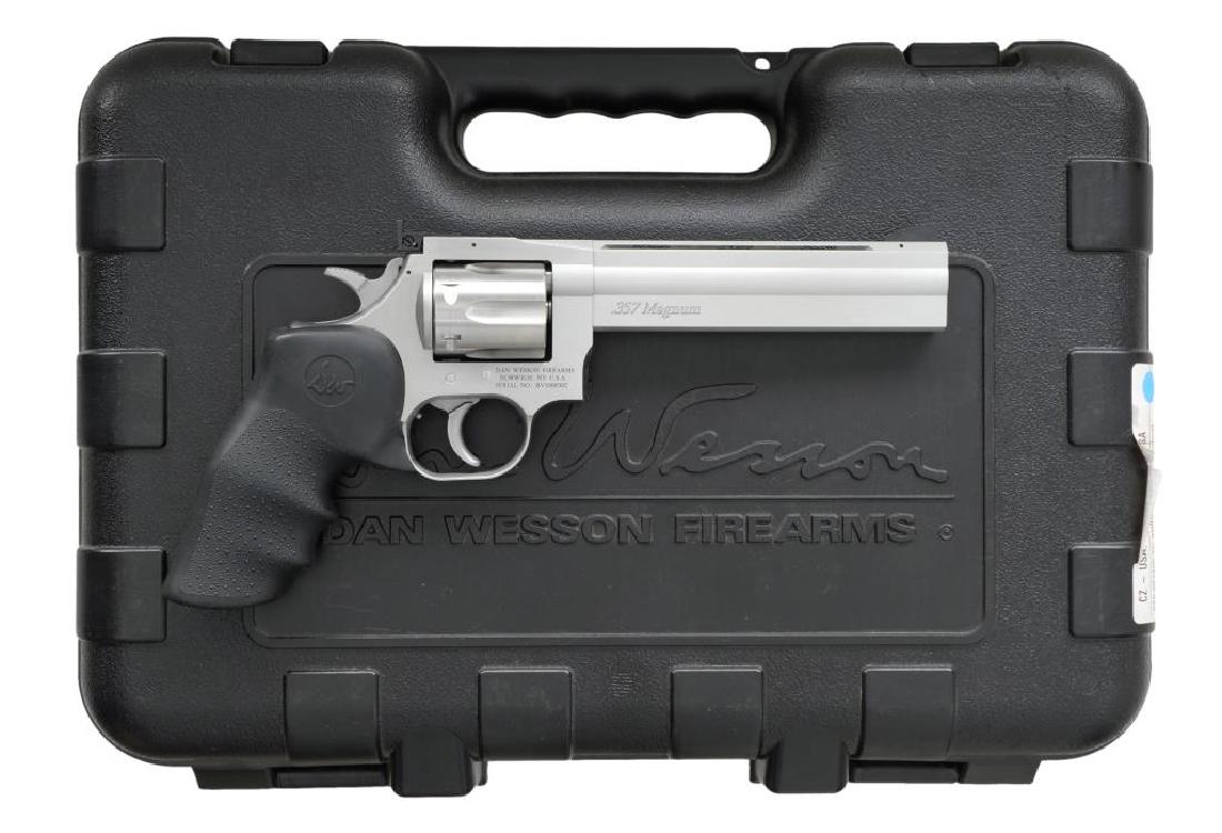DAN WESSON STAINLESS MODEL 715 REVOLVER.: Cal. 357 Mag. S# RV1000302. Mfg. 2011 & 2012 in Norwich, NY & distributed by CZ USA. Heavy full lug 6" VR bbl. w/ blued serrated front sight & Dan Wesson marked Millett style adj. rear. Hogue finger g