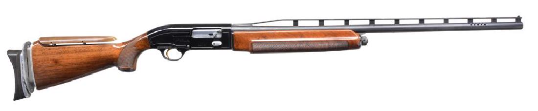 BERETTA A303 TRAP SHOTGUN.: Cal. 12 Ga. S# M15831E. 30" Ported bbl. 2 3/4". Choked Full w/ high aftermarket trap rib. Blued action & bbl. Checkered walnut pistol grip stock w/ grip cap & adj. comb. Comb covered w/ leather & butt