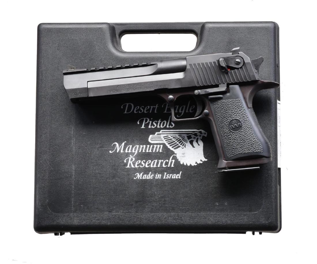IMI DESERT EAGLE PISTOL.: Cal. .50 AE. S# 43204550. Bbl. 6". Dovetailed rear sight w/ fixed blade front. 3 1/2" Picatinny rail atop the bbl. Anodized black frame, slide & bbl. Textured composite wrap around grips w/ "IWI" logo