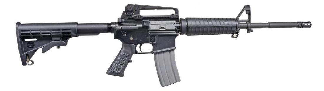 BUSHMASTER MODEL XM15-E2S SEMI AUTO CARBINE.: Cal. 223 Rem. - 5.56mm. S# LBM54045. Rem. mfg. w/ BFI & Ilion NY on frame. A3 flat top upper w/ detachable carry handle having A2 sights, shell deflector & forward assist. 6 Position buttstock & short