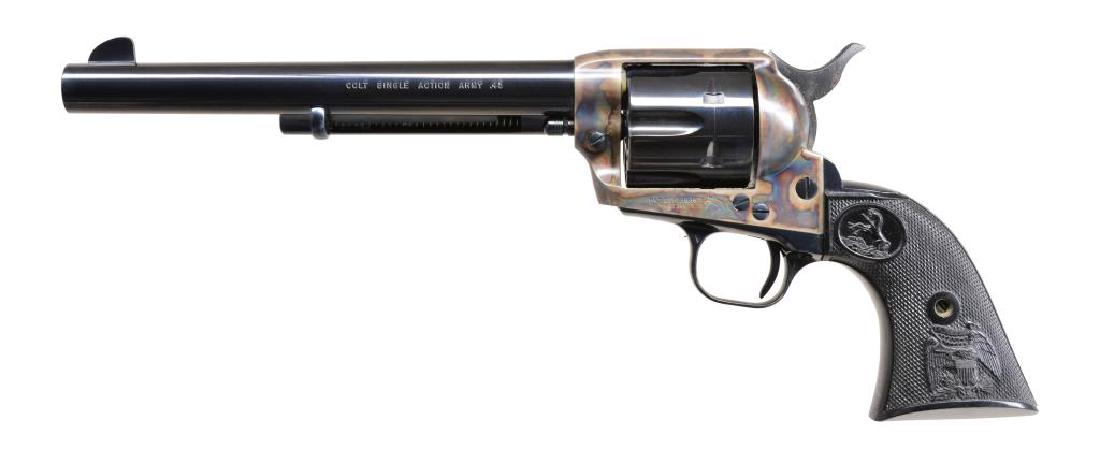 COLT SAA 2ND GEN. REVOLVER.: Cal. 45 Colt. S# 68515SA. Bbl. 7 1/2". Six shot fluted cyl. Blue & case colored finish. 2 Piece checkered plastic eagle grips. 1973 Mfg. CONDITION: bbl., cyl. & grip straps retain over 98% bright blue