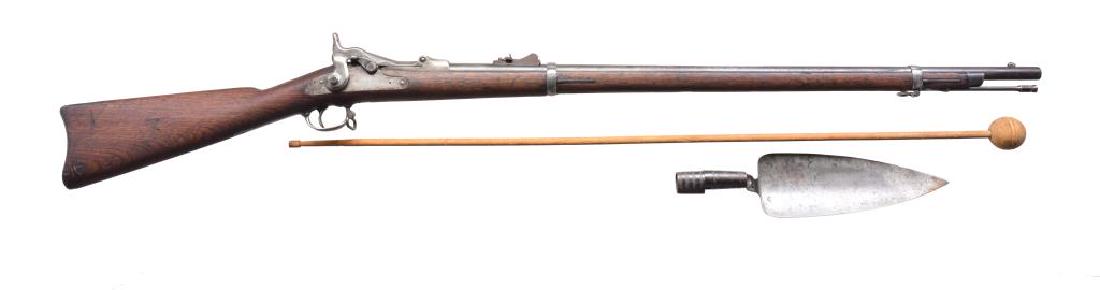 SPRINGFIELD 1873 TRAPDOOR RIFLE WITH TROWEL: BAYONET. Cal. 45-70. S# 22649. Bbl. 32 5/8". Custer range carbine refurbished by Springfield Armory. Model 1879 rifle rear sight. High arch 1873 breechblock. 2 Band long comb walnut stock w/ partially
