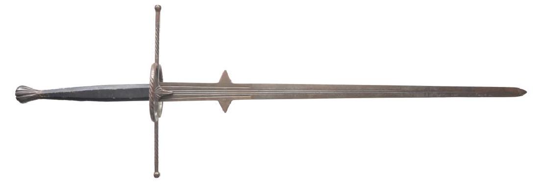 VICTORIAN COPY OF A GERMAN 2 HANDED BROAD SWORD.: Overall length: 57 1/2". Blade length: 42 1/4". This is a well executed Victorian period copy of a 16th century German 2 handed broad sword also known as a Zweihander. Blade has a single fuller changi