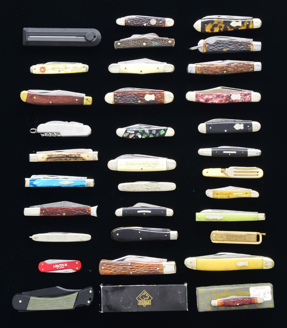 32 ASSORTED FOLDING KNIVES.: ALL KNIVES ARE NEAR EXCELLENT UNLESS NOTED. One 3 1/2" Case long tail C XX USA 1 dot swell center Whitler. White smooth bone scales. All blades appear unused in near excellent condition. / One 2 3/4"