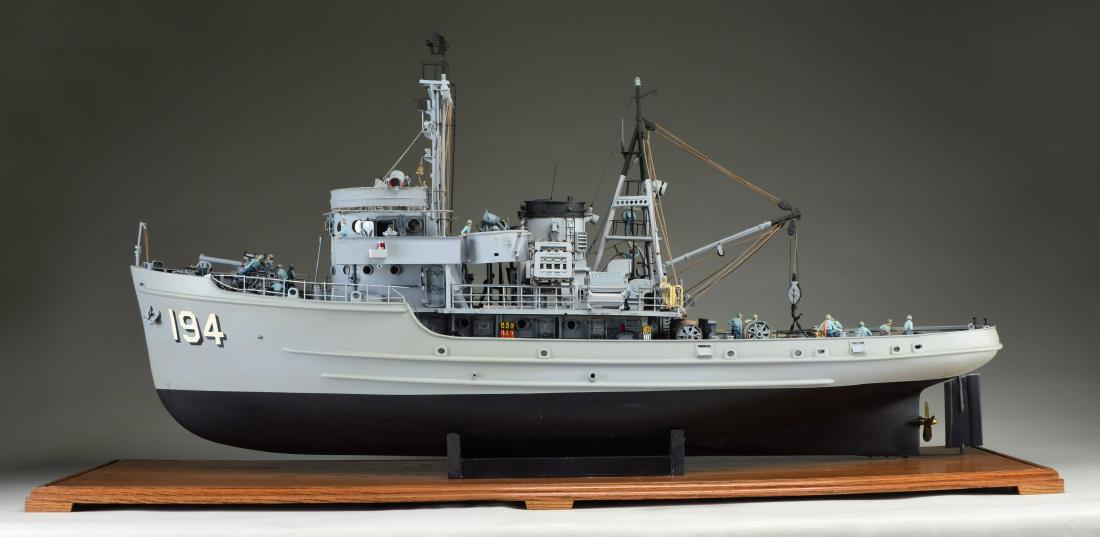 MODEL OF THE USS BAGADUCE.: A Sotoyomo class ocean fleet tug of 1944. Saw service in the U.S. Navy until 1959. Transferred to the Coast Guard as USCG MODOC 1959-1980. Highly detailed model inside case measuring 58" x 30" x16". C