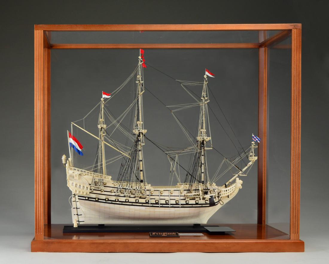 BONE MODEL OF DUTCH SHIELD FRIESLAND.: A ship of 80 guns which fought at the Battle fo Solobay w/ the Dutch fleet against the English & French in 1672. This model is all built of ox bone & is a precise miniature of the original ship. Model