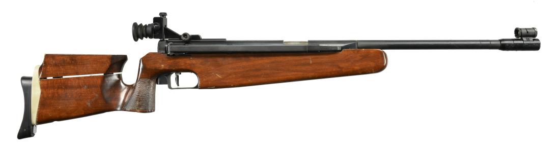 RWS DIANA MODEL 75 T 01 MATCH GRADE PELLET RIFLE.: Cal. 177 / 4.5mm. 580 FPS. S# 00074166. Bbl. 19". Side cocking spring piston action. Globe front sight w/ Gamo match grade aperture rear sight having rubber eyepiece. Adjustable single stage trigger.