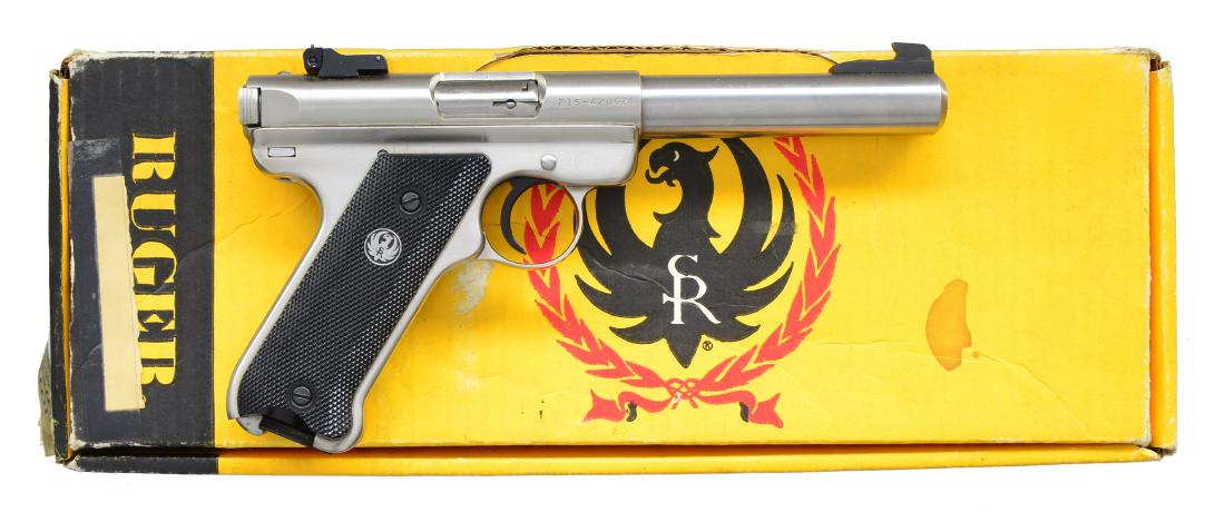RUGER MKII TARGET PISTOL.: Cal. 22 LR. S# 215-42062. Bbl. 5 1/2" heavy. Target sights. Left side of receiver is marked "RUGER .22 CAL. LONG RIFLE" & "II TARGET". Checkered factory black plastic grips, silver eagle on right pane