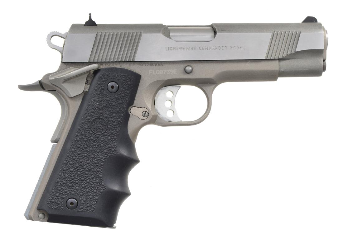 COLT STAINLESS LIGHTWEIGHT COMMANDER SEMI AUTO: PISTOL. Cal. 45 ACP. S# FL08739E. Mfg. 2001 w/ 4 1/4" stainless lightly throated bbl. & slightly polished feed ramp. All matte finished except bright slide sides. Numerous desirable features include: