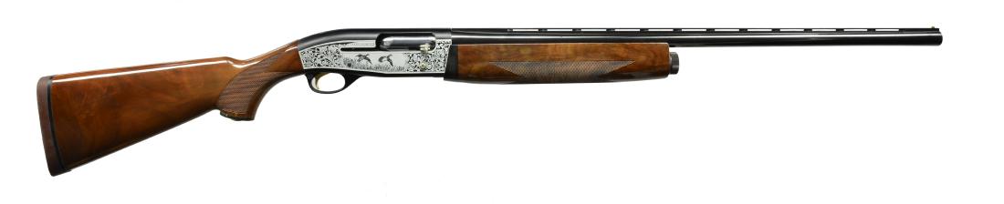 SKB 1900 DUCKS UNLIMITED O/U SHOTGUN.: Cal. 12 Ga., 3". S# 89DU1827. Bbls. 28" VR w/ screw in chokes. Anodized black action w/ anodized silver waterfowl scenes on both sides. Blued steel bbl. Checkered walnut pistol grip stock w/ Ducks Unl