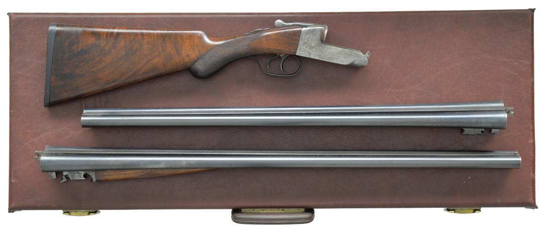 ITHACA FLUES MODEL FIELD GRADE SXS SHOTGUN TWO: BARREL SET. Cal. 16 Ga., 2 5/8". S# 228449. Bbl. 25". 1) Cyl. & improved cyl. 2) 28" improved cyl. & mod. Color cased hardened action. Blued steel bbls. Checkered walnut rnd. knob pistol grip stock w/