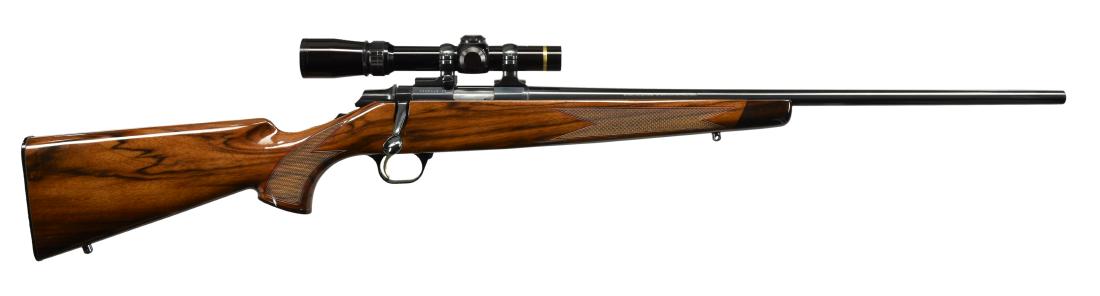 BROWNING A-BOLT 22 MAGNUM BOLT ACTION RIFLE.: Cal. 22 Win. Mag. S# 03820NZ136. Bbl. 22" w/ no sights. Leupold Vari X III 1.5-5X scope in Leupold rings & bases. Blued steel action & bbl. Checkered walnut stock w/ contrasting forend & grip caps, bl