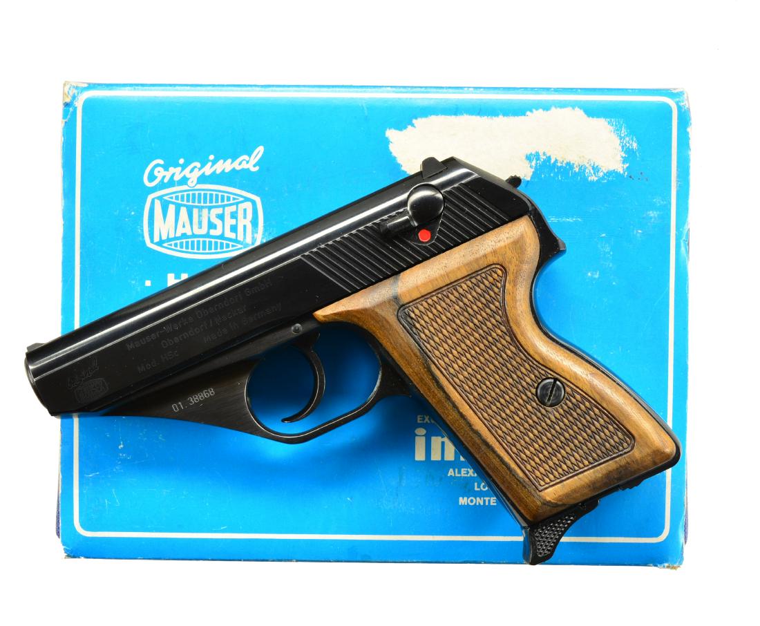 INTERARMS MAUSER MODEL HSc SEMI AUTO PISTOL.: Cal. 380 ACP. S# 01.38868. Mfg by Mauser in Germany & imported by Interarms 1983-1985. Checkered hardwood grips. Matching numbered slide. MAGS: 2 factory 8 rd. TOTAL; flat base & finger extension. UNA