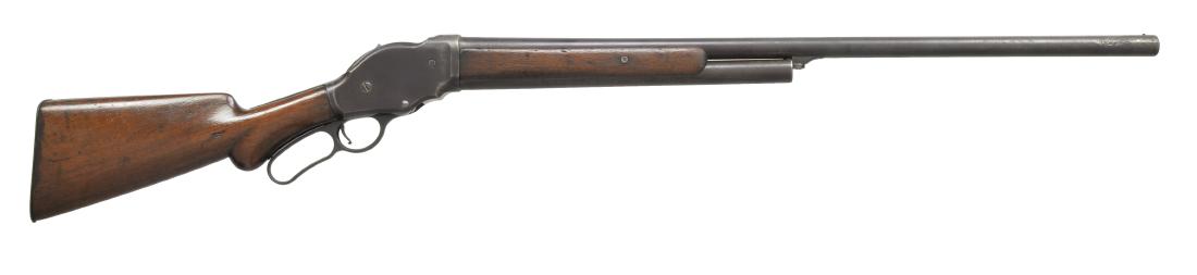 WINCHESTER 1887 LEVER ACTION SHOTGUN.: Cal. 12 Ga., 2 5/8". S# 15469. Bbl. 30". Left side of action has circular "WRA" marking. Walnut forearm, panels & rnd. knob stock w/ steel shotgun buttplate. CONDITION: metal has brown patina appearan