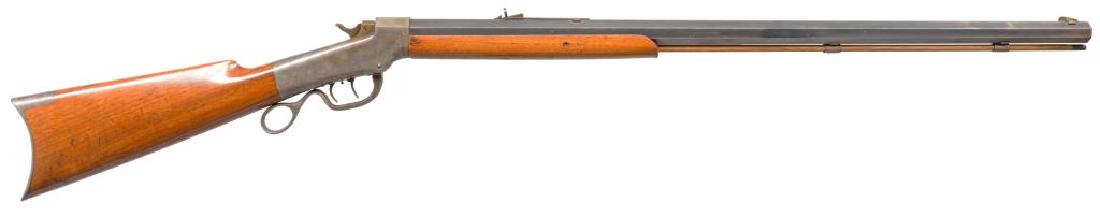 MARLIN BALLARD NO. 5 PACIFIC SINGLE SHOT RIFLE.: Cal. 45 Gov't (45-70). S# 30562. Bbl. 32" medium heavy weight octagon. Rocky Mountain front sight w/ sporting rear sight. Brass tipped hardwood ramrod is held by 2 faceted pipes. Case colored action w