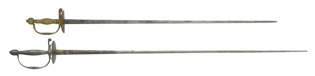 2 EARLY EUROPEAN SMALL SWORDS.: 1) ITALIAN OR SPANISH SWORD. Overall length: 33". Blade length: 28". A rapier style blade w/ a central fuller extending down 7 1/2" to the hilt. The valley of the fuller on both sides is punch decorat