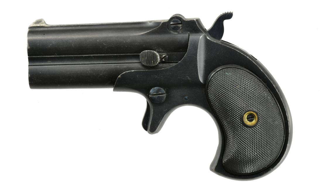 REMINGTON O/U DERINGER.: Cal. 41 RF Short. S# L75570. Bbls. 3" rnd. w/ fluted ribs. Rib is marked "REMINGTON ARMS-U.M.C. CO. ILION, N.Y." Matte finished metal w/ fire blued latch. Late production style grooved hammer. 2 Piece