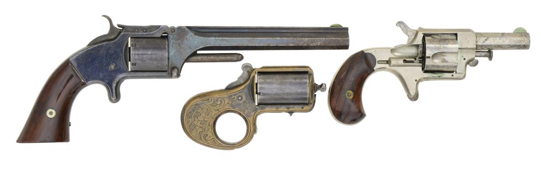 3 ANTIQUE REVOLVERS BY JAMES REID & SMITH &: WESSON. 1) JAMES REID NO. 4 DERINGER. Cal. 41 RF. S# 17906. Bbl. 2 3/8" oct. w/ semi circular German silver sight. Top flat is marked "REID'S EXTR". 5 Shot fluted cyl. Action features spur trigger w/