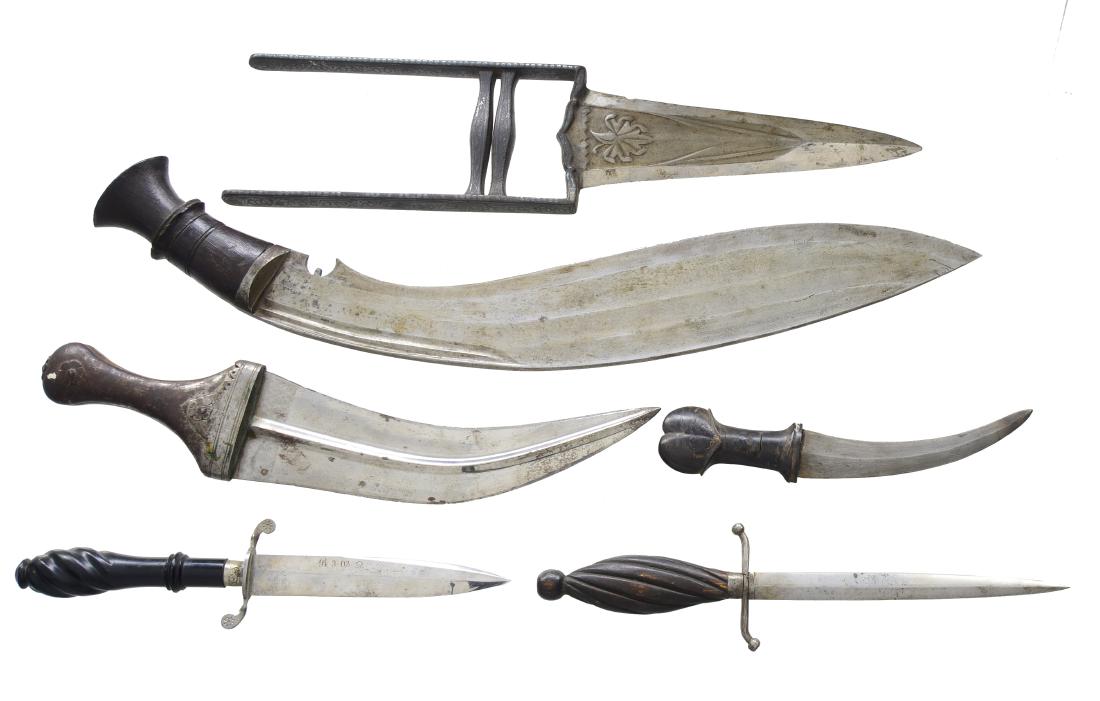 6 EDGED WEAPONS.: 1) INDIAN KATAR. Overall length: 14 1/2". Blade length: 7". The katar is a traditional weapon endemic to Hindu India. Blade appears to be high carbon steel w/ a central floral decoration. The haft is 