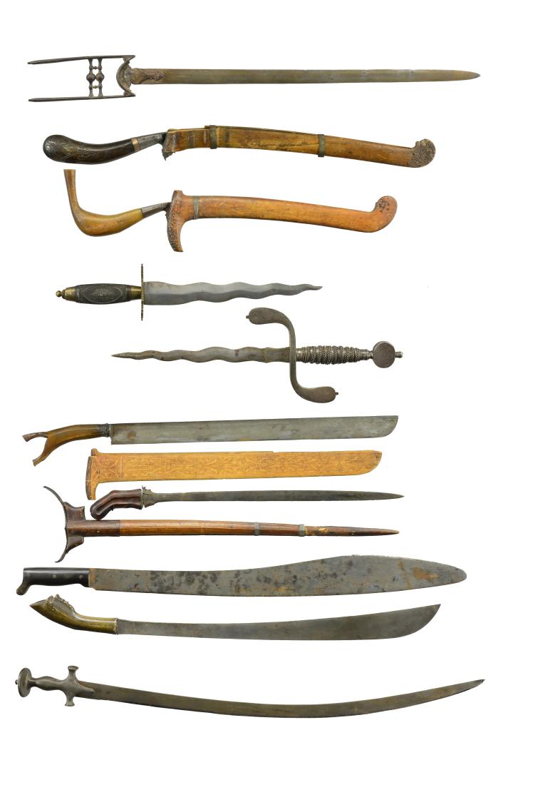 10 EDGED WEAPONS.: 1) KATAR SWORD. Overall length: 36". Blade length: 28 1/8". A seldom seen modification of the Hindu Indian katar utilizing a sword blade instead of the usual short triangular blade. Plain slightly ell