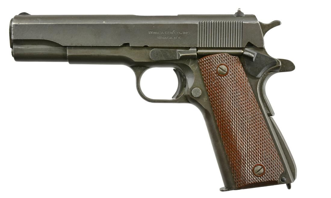 ITHACA MODEL 1911A1 LEND LEASE SEMI AUTO PISTOL.: Cal. 45 ACP. S# No 1443186. Mfg. 1943. Wide serrated ramp front sight. Flat rear sight w/ square notch. Flat sided checkered hammer. Long tang grip safety. Serrated mainspring housing. Serrated slide