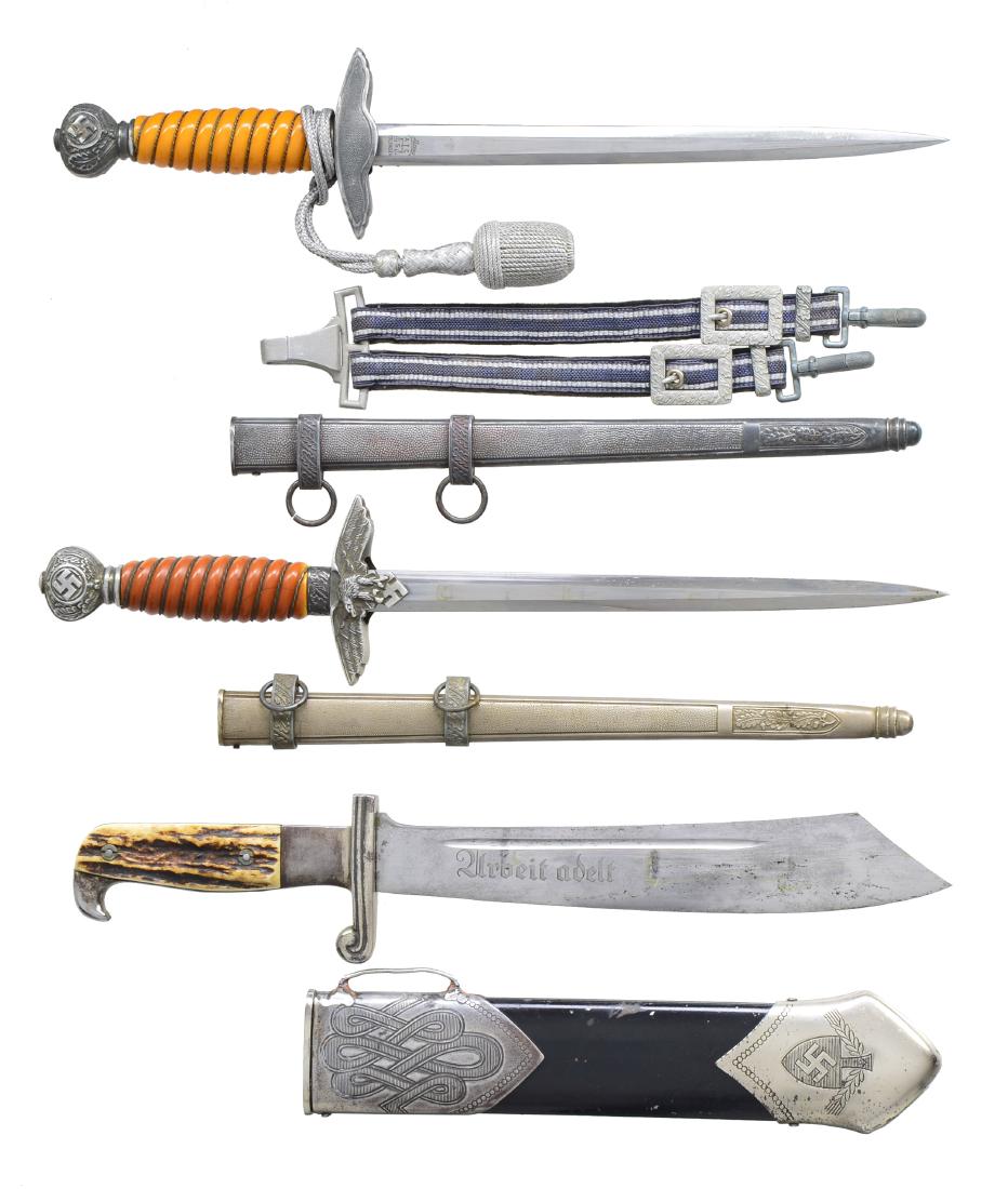 3 WWII GERMAN DAGGERS.: 1) SECOND MODEL LUFTWAFFE. Overall length: 17". Blade is marked "Alcoso A C (scale) S SOLINGEN". Aluminum crossguard & pommel. Wire wrapped orange composite grip. Attached dagger knot. Steel scabbard 