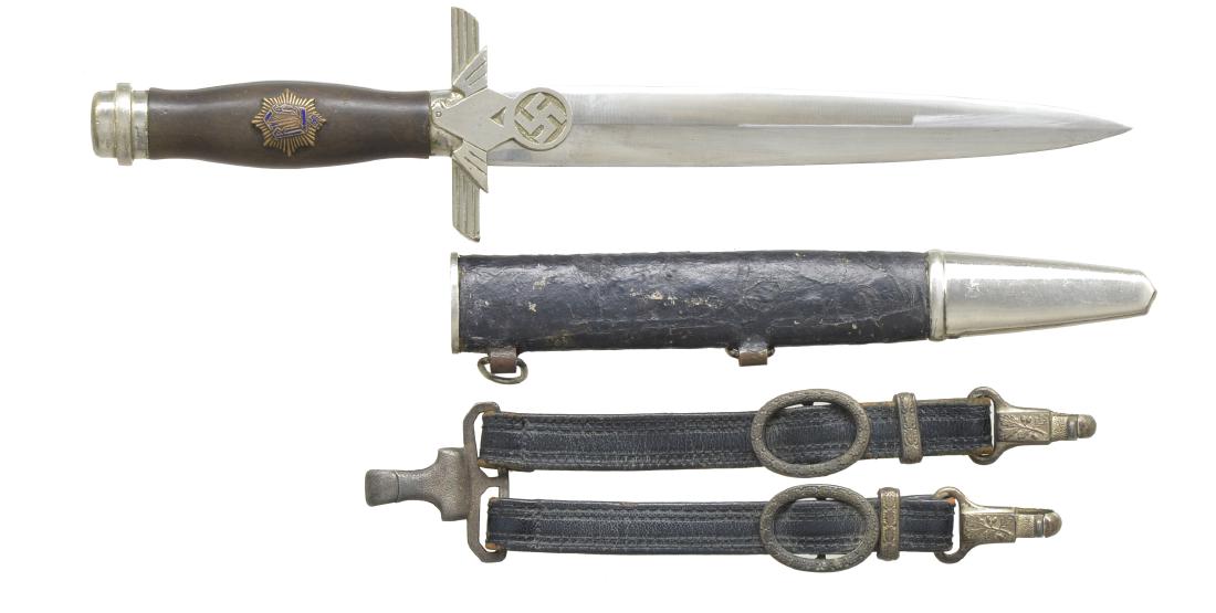 WWII GERMAN ENLISTED 1ST MODEL RLB DAGGER: WITH ALTERATIONS. Overall length: 14 3/8". Blade is marked "(knight's head) WKC WAFFENFABRIK SOLINGEN". Plated stylized eagle crossguard w/ symbol inside solid circle. Plated pommel. Wood grip w/ cent