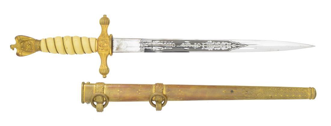 WWII GERMAN NAVAL OFFICERS DAGGER.: Overall length: 16 5/16". Blade is marked "ORIGINAL (squirrel) EICKHORN SOLINGEN". Blade is etched for 5 1/2" up from the ricasso. Etching included various nautical motifs. Gilded brass crossguard & p