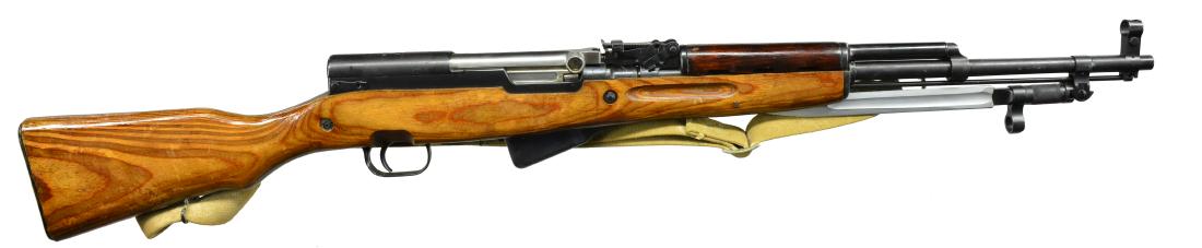 RUSSIAN SKS RIFLE.: Cal. 7.62x39. S# AB 4098. Bbl. 20". Mfg. at Tula Arsenal 1954. Blade bayonet. Factory 10 rd. non detachable mag. Matching numbers throughout all obvious parts, such as receiver, bolt, trigger guard, m