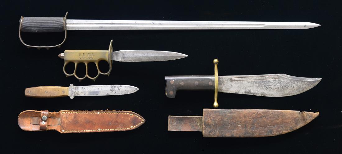 4 SCARCE U.S. MILITARY COMBAT & COMMANDO KNIVES.: 1) OSS DROP KNIFE. These knives were dropped in the Phillipine Islands by the OSS. This model is fabricated from Model 1913 Patton sword blades w/ black rubber hose handle. 27 5/8" Fullered dbl. edge 