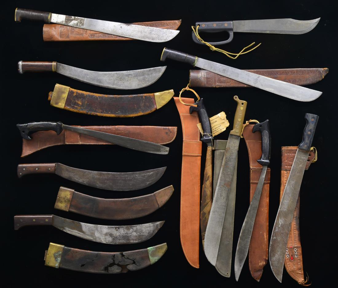 11 MACHETE TYPE ITEMS.: 1) Phillipine Bolo style 16" blade noticeably reduced at checkered black plastic handle. Leather sheath burned at tip. 2) Same as # 1 w/ new appearance & tag stating not to remove from sheath until re