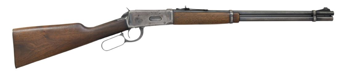 WINCHESTER 94 PRE 64 LEVER ACTION CARBINE.: Cal. 32 Win. Spl. S# 2190959. Bbl. 20" w/ ramp mounted bead front sight & elevator adj. sporting rear sight. Full length mag. Short tip walnut forearm & straight grip stock w/ checkered buttplate. CON