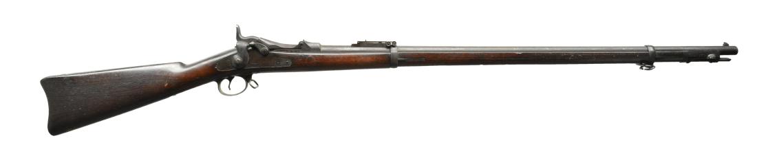SPRINGFIELD 1888 TRAPDOOR SINGLE SHOT RIFLE.: Cal. 45-70. S# 528668. Bbl. 32 5/8". Ramrod bayonet w/ wrap around locks. Rifle features a Buffington type rear sight. Top of breech dated 1884 as expected. 1 Piece trigger guard. Lock is marked "(eag