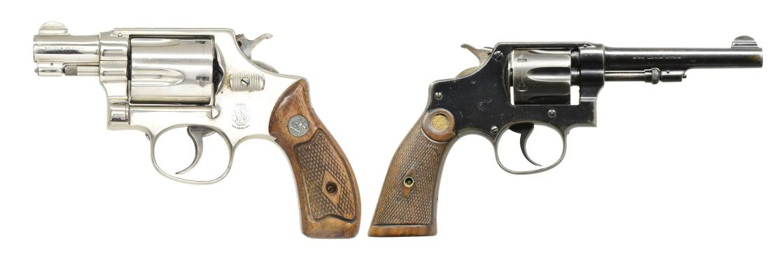 2 SMALL FRAME SMITH & WESSON REVOLVERS.: 1) CHIEFS SPECIAL. Cal. 38 Spl. S# 2165. Early nickel pre 36 flat latch 5 screw model w/ pinned 2" bbl. & rnd. butt. Mfg. 1950. Unnumbered diamond center checkered walnut Magna grips. Case colored tri