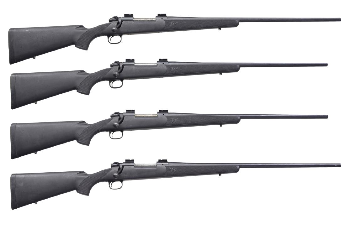 4 WINCHESTER MODEL 70 BOLT ACTION RIFLES.: 1) Cal. 7mm Rem Mag. S# G2216049. 26" Bbl. marked "WINCHESTER MODEL 70 7MM REM MAG". Receiver fitted w/ Weaver bases; no provision for iron sights. Black composite checkered stock w/ blind mag. CONDIT