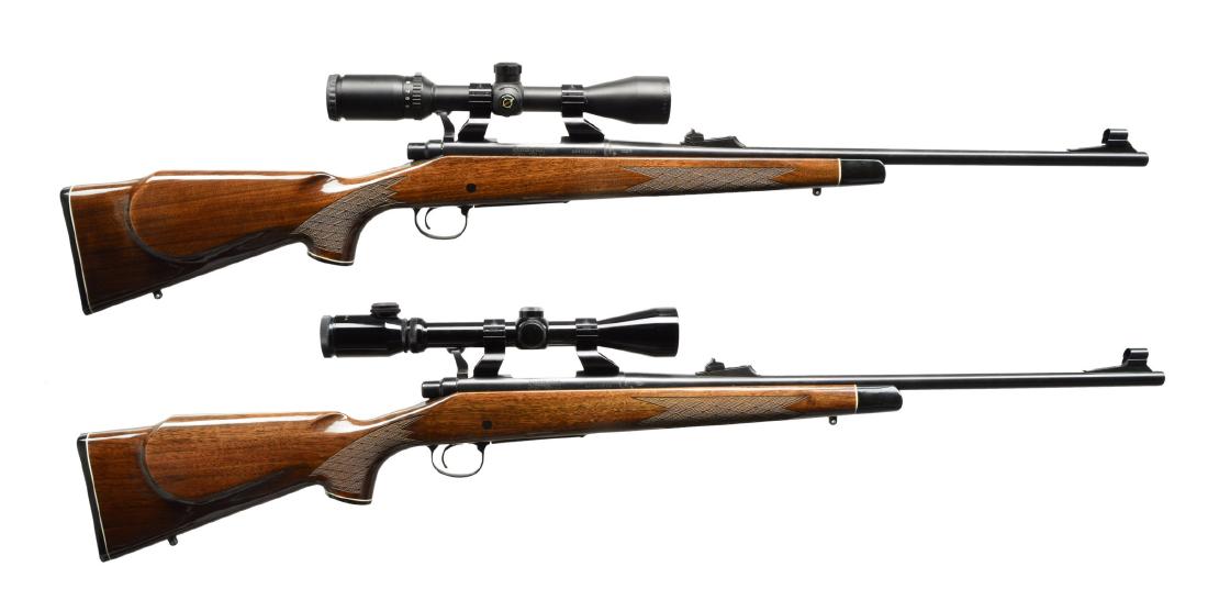 2 REMINGTON 700 BDL LEFT HANDED BOLT ACTION: RIFLES. BOTH: hooded ramp front sights. Adj. rear sights. American walnut stocks. High gloss finish. Black forend caps. White line spacers. Monte Carlo comb profile & cheekpieces. Finely cut checkerin