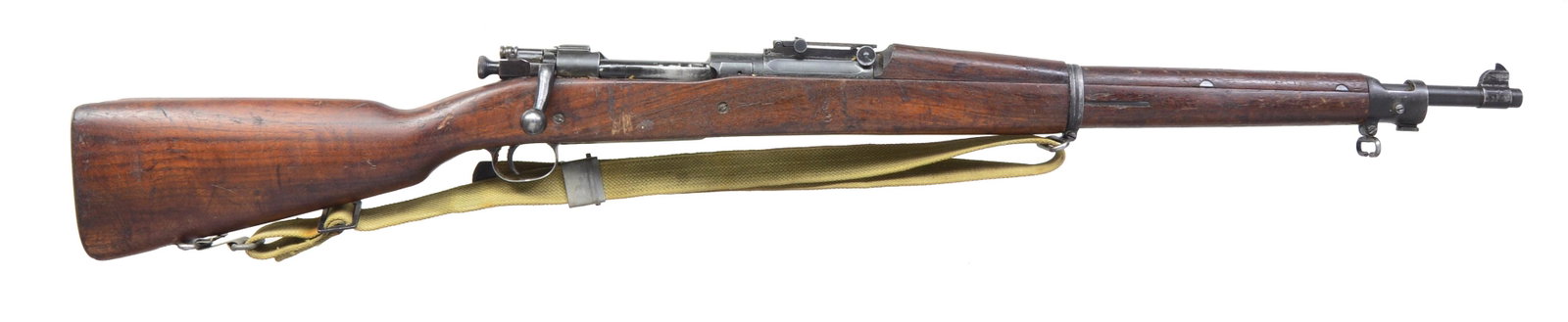 SPRINGFIELD MODEL 1903 BOLT ACTION RIFLE.: Cal. 30-06. S# 1346712. Bbl. 24". Bbl. marked "SA", flaming bomb & "2 42". Ladder rear sight graduated to 2,850 yards. Flat elevation knob. Dished windage knob. Blade front sight. All milled furniture