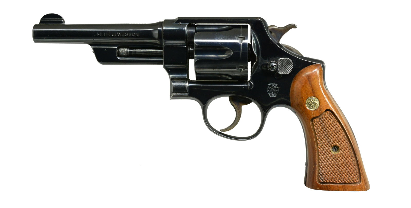 PREWAR SMITH & WESSON 38/44 HEAVY DUTY DA: REVOLVER. Cal. 38 S&W SPL. S# 46739. Bbl. 5”. Pinned w/ 1/10” round blade front sight. Square notch rear sight. Smooth front & backstrap. Five screw N frame. Six shot cylinder. .265”