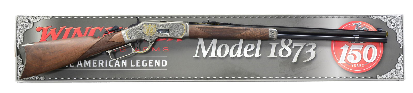 WINCHESTER 1873 150TH COMMEMORATIVE RIFLE.: Cal. 44-40. S# 150A730133. Bbl. 24" oct. Dovtail bead front. Adj. rear. Muzzle has gold band. Left side of bbl. below rear sight is marked in gold "The American Legend 1866-2016". Receiver is engraved