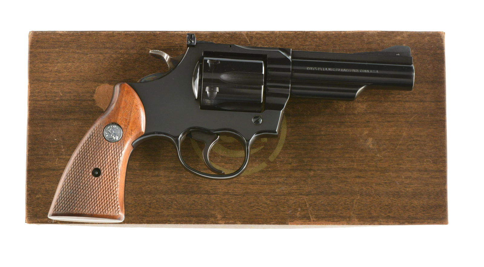 COLT MKIII TROOPER DA REVOLVER.: Cal. 357 Mag. S# J13227. Bbl. 4". Marked on left side "TROOPER MKIII 357 MAGNUM CTG.", right side "COLT'S PT. FA MFG CO HARTFORD, CONN U.S.A.". All visible numbers match including checkered wooden gri