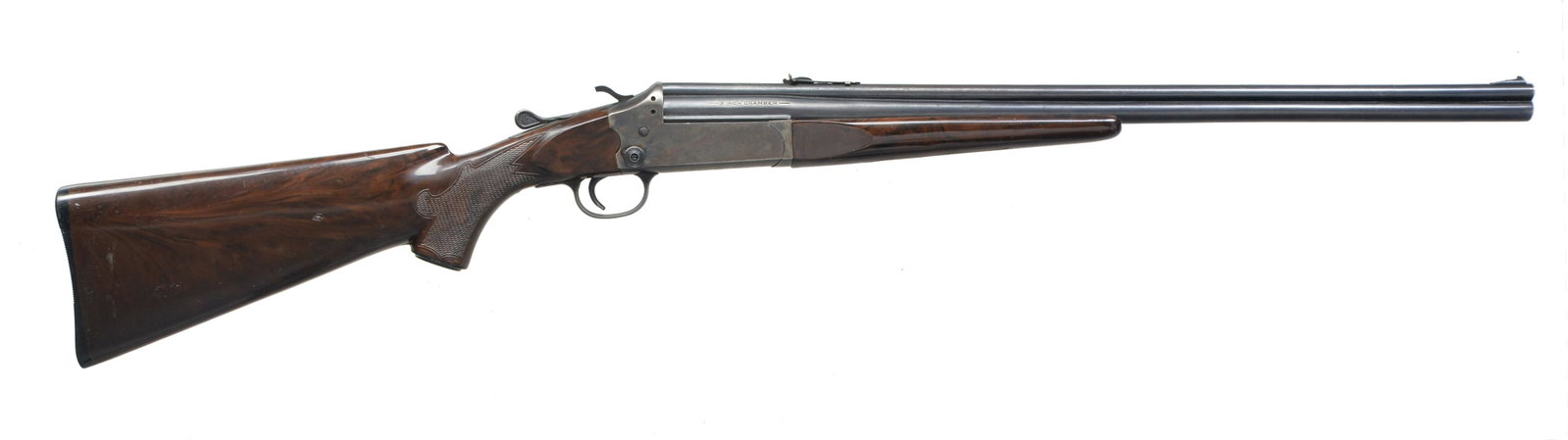 STEVENS MODEL 22-410 COMBINATION: Cal. 22 LR / 410, 3". NSN. Bbls. 24" w/ ramp front sight & elevator adj. rear sight. Exposed hammer case colored action w/ bbl. selector on right side. Tenite forearm & pistol grip stock. CONDITION: 7