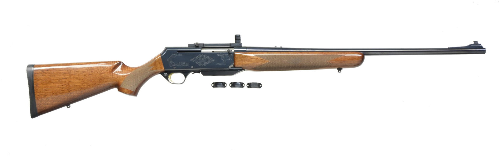 BROWNING BAR SAFARI MARK II AUTOLOADING RIFLE.: Cal. 338 Win. Mag. S# 107NV01914. Bbl. 24" w/ replacement ramp mounted bead front sight. Rear sight is removed. Leupold scope rings are missing screws. Bright blue finish w/ scroll ornamentation on ac