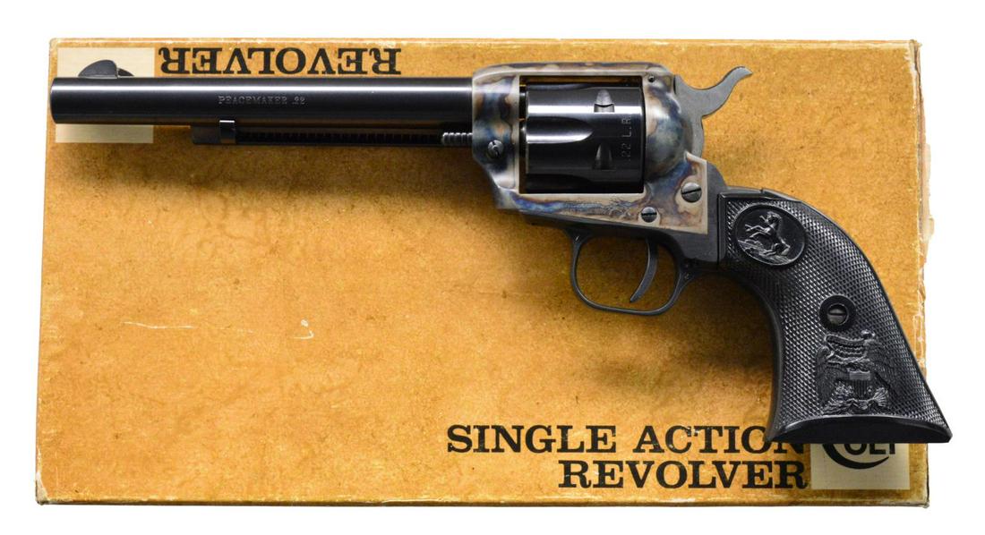 COLT PEACEMAKER 22 SCOUT SA REVOLVER.: Cal. 22 LR. S# G91141. Bbl. 6". 6 Shot fluted cyl. blued bbl. & cyl. w/ case colored frame & black finished alloy trigger guard. 2 Piece checkered plastic eagle grips. Mfg. 1974. UNATTACHED ACCESSORIE
