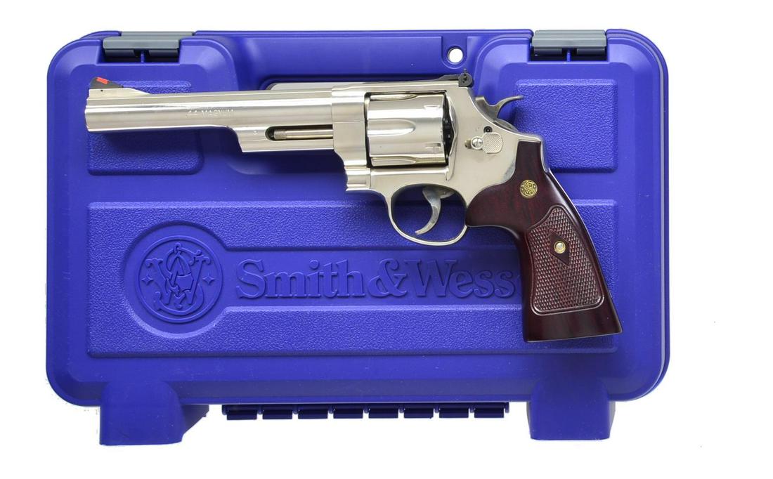 SMITH & WESSON NICKELED MODEL 29-10 REVOLVER.: Cal. 44 Mag. S# DAZ1862. Bbl. 6 1/2" like originals rather than mid production 6" variation. Mfg. 2007 as modern remake of iconic original. Case colored target trigger & hammer. Red ramp front blade &