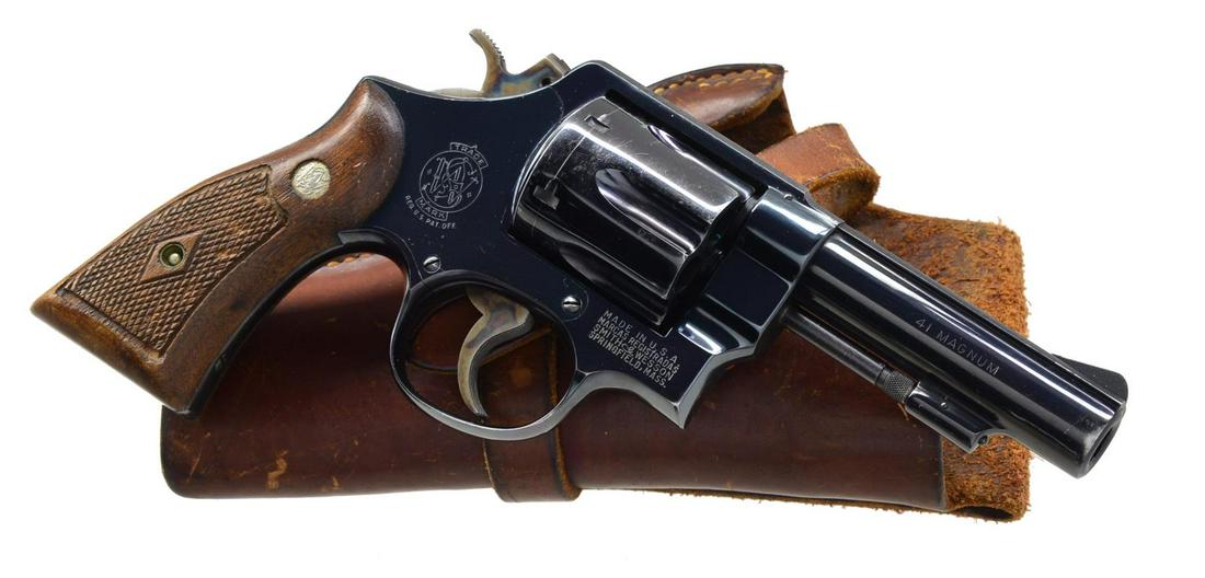 SMITH & WESSON MODEL 58 DA REVOLVER.: S#. S258518. Cal. 41 Magnum. BBL 4" w/ rib & serrated ramp front sight. 6 shot fluted cylinder. "N" frame 3 screw action w/ pinned bbl. Blue finish. Case colored .260 service hammer & grooved trigger.