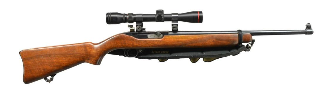 RUGER 44 SEMI AUTO CARBINE.: Cal. 44 Mag. S# 74452. Bbl. 18 1/2". Bbl. band mounted extended high bead front sight w/ peep receiver sight mounted on custom built elevator. Simmons 3-9x32 matte finished scope w/ duplex reticle on 