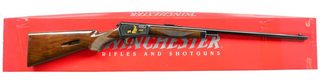 WINCHESTER 63 HIGH GRADE SEMI AUTO RIFLE.: Cal. 22 LR. S# STH0907. Bbl. 23" rnd. w/ sporting sights. Blued receiver w/ grooved top & gold plated trigger. Action has Ulrich style engraving featuring vignettes of gold plated rabbits on right & s
