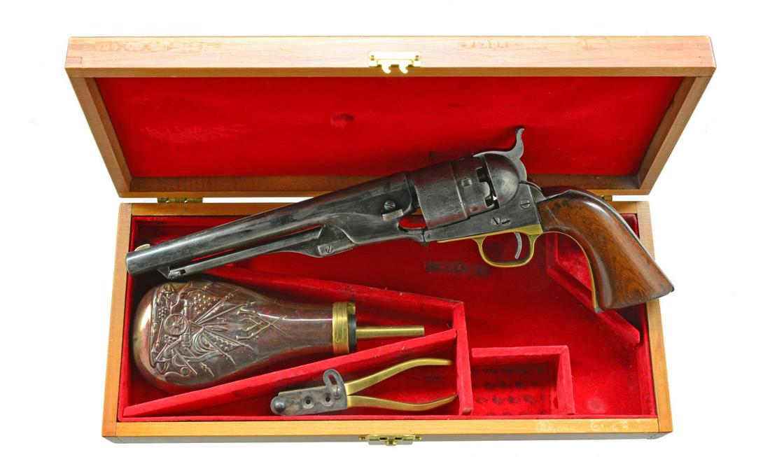 COLT MODEL 1860 ARMY REVOLVER.: Cal. 44. S# 179821. Bbl. 8" in the standard configuration w/ one line address. Made in 1869 near the end of production of Colt Percussion firearms. UNATTACHED ACCESSORIES: modern wood case w/ a reprod
